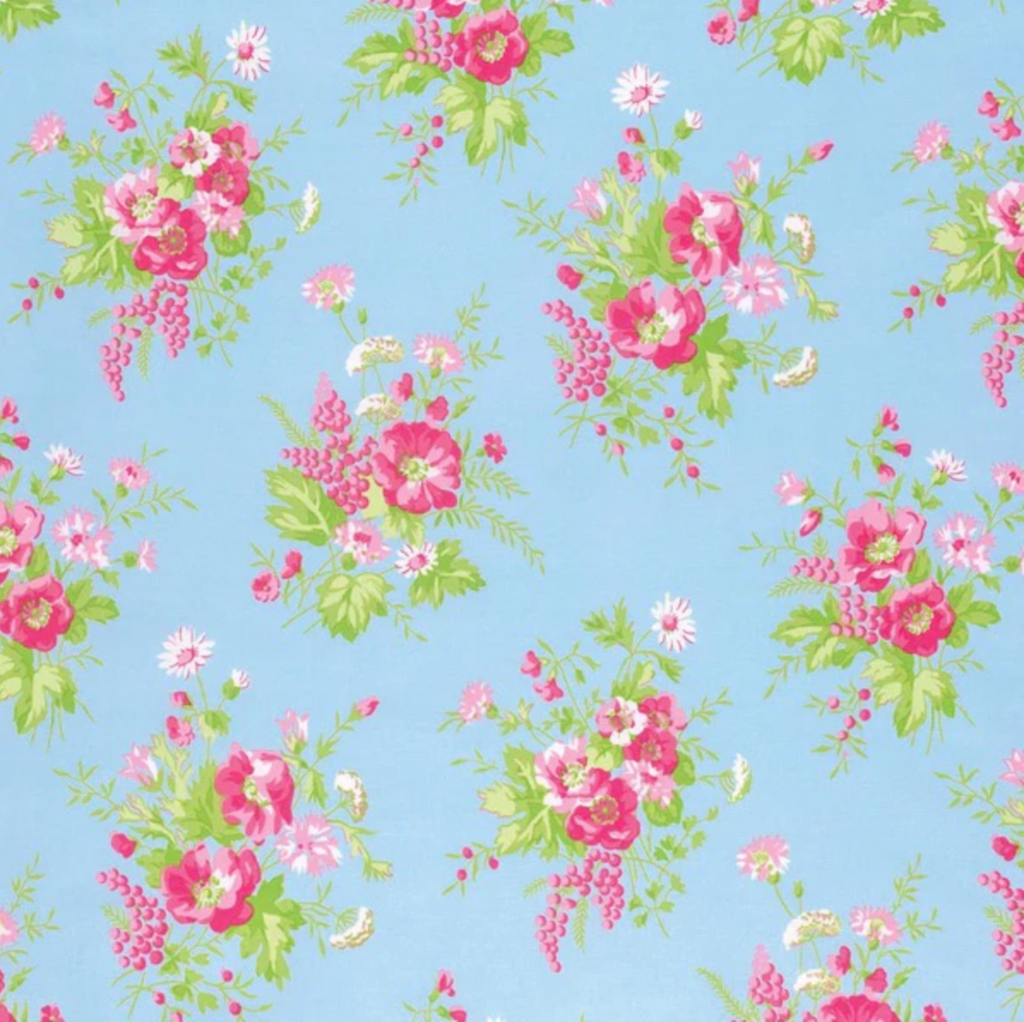Floral pattern with pink and green flowers on a blue background