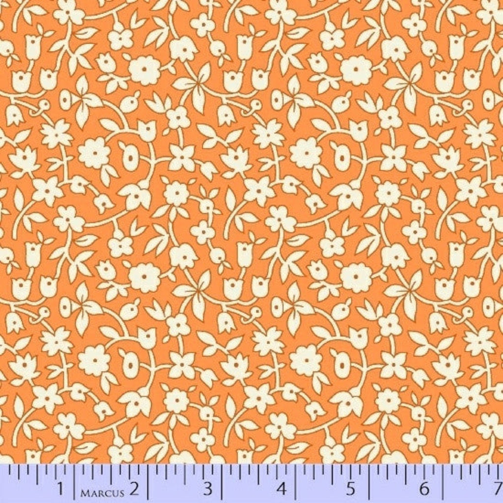 Floral pattern fabric swatch on an orange background with a ruler at the bottom.