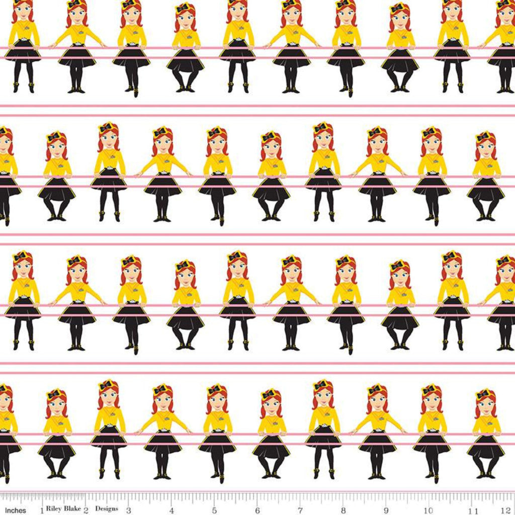 Fabric with a print of Emma Watkins from The Wiggles in a ballet outfit at a barre, with a ruler at the bottom showing the fabric's width.
