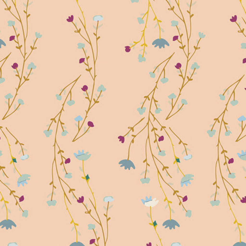 A fabric with a floral pattern featuring various colors like pink, blue, and green.