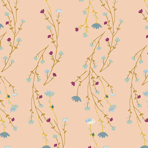 A fabric with a floral pattern featuring various colors like pink, blue, and green.