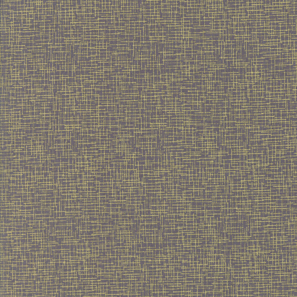 A textured fabric with a geometric pattern featuring grey and gold colors.
