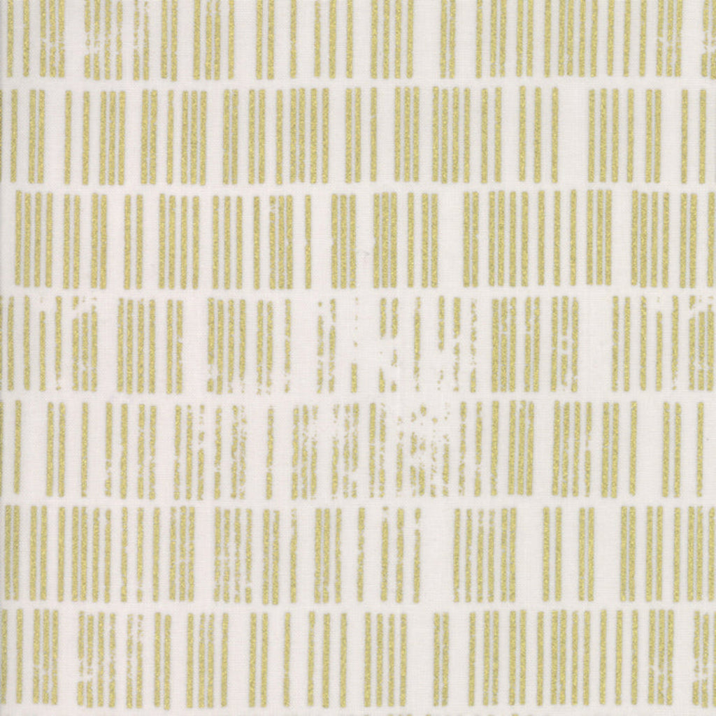 A fabric with a modern geometric pattern in white and gold colors.