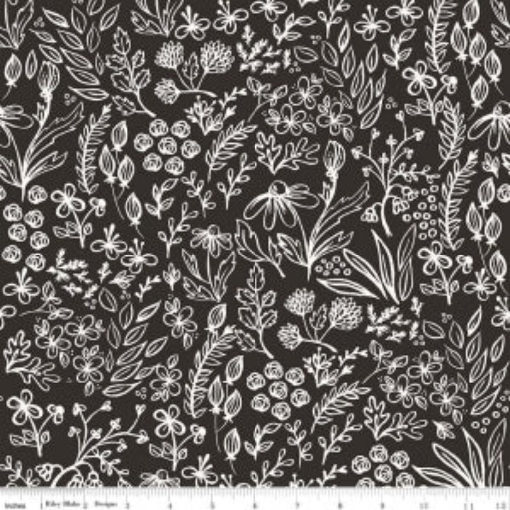 Black fabric with a white floral pattern