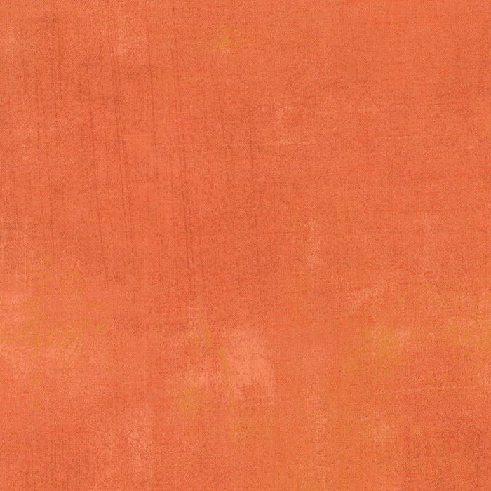 Solid orange color swatch with a textured pattern