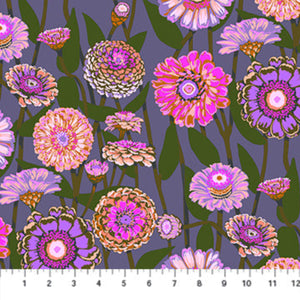 Colorful floral pattern on a fabric swatch with a ruler at the bottom.