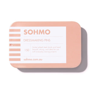 Pink tin of SOHMO dressmaking pins on a white background