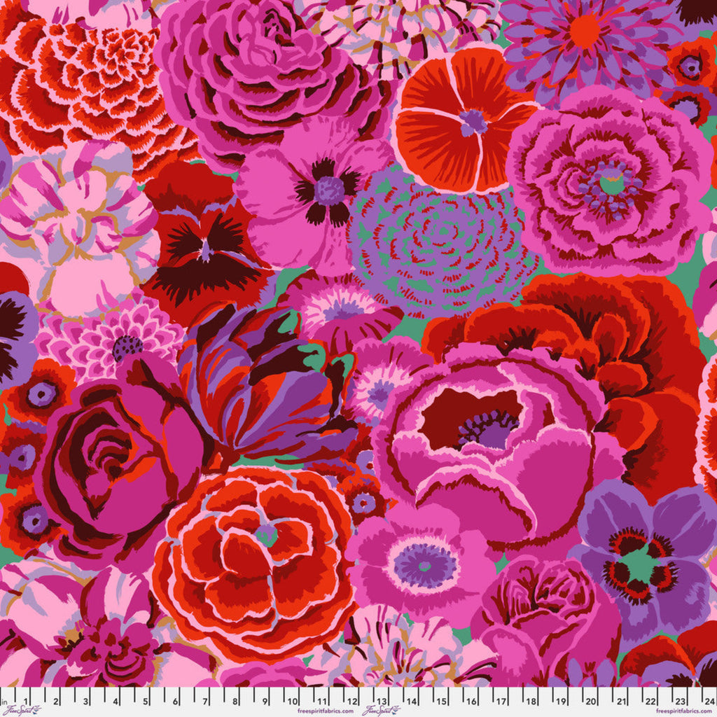 Colorful floral pattern with pink, red, and purple flowers on a green background.