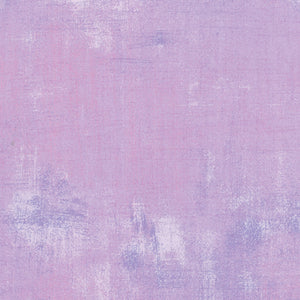 Textured purple background with a subtle pattern