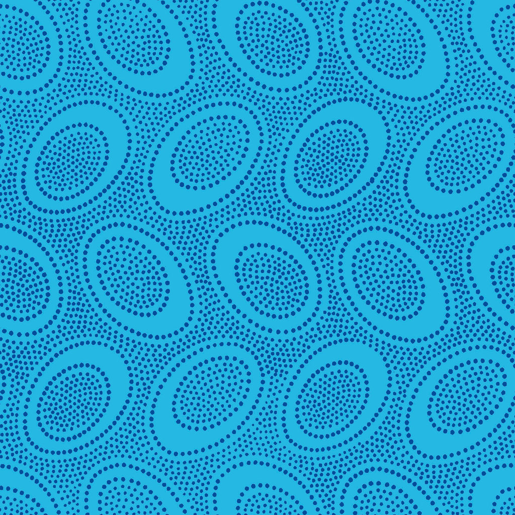 Blue patterned fabric with circular shapes