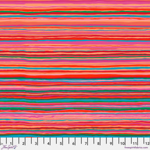 Colorful striped fabric pattern with a ruler at the bottom