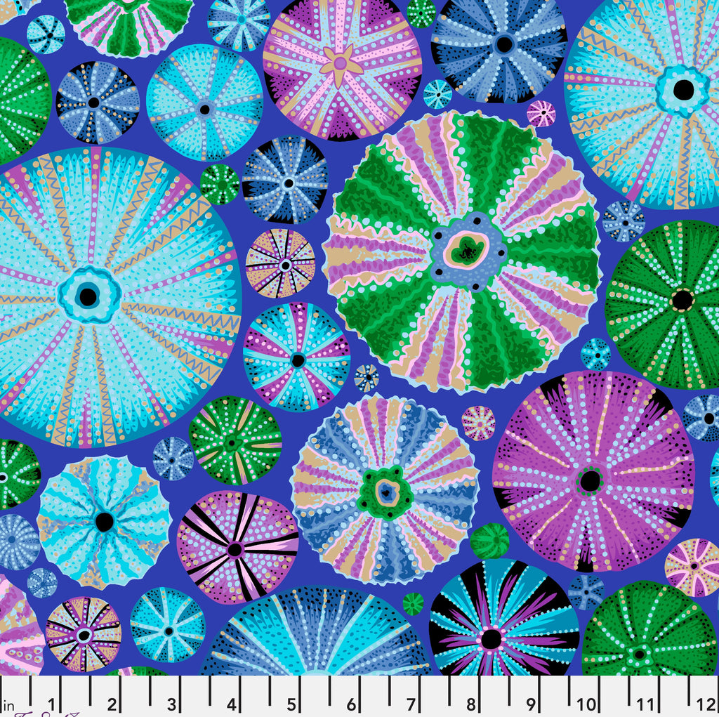 A fabric featuring a repeating pattern of colorful sea urchins on a blue background.