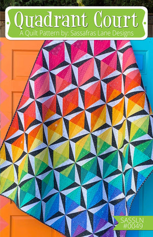 A colorful quilt with a geometric pattern, titled 'Quadrant Court' by Sassafras Lane Designs.