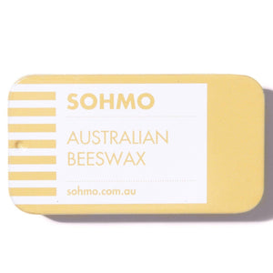 Rectangular block of Australian beeswax with 'SOHMO' branding on a white background