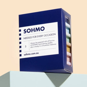 Box of SOHMO needles on a light beige background