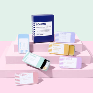 Collection of SOHMO products on a pastel pink and blue background