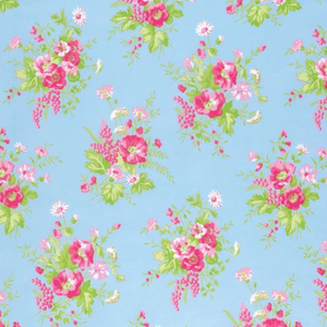 Floral pattern with pink and green flowers on a blue background