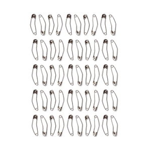 Multiple safety pins arranged in a grid on a white background