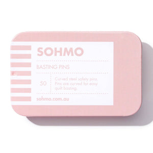 Pink tin box with 'SOHMO' branding on a white background