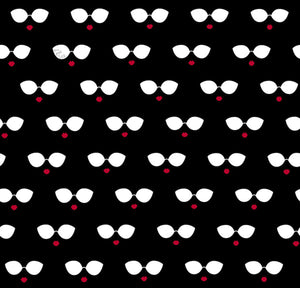 A fabric with a repeated pattern of sunglasses and a small heart, primarily in black, white, and red colors.