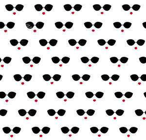 Pattern of black sunglasses with red hearts on a white background