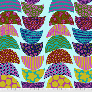 A piece of fabric featuring a colorful geometric pattern with semi-circular shapes arranged in a stacked design, resembling a garden or floral motif.