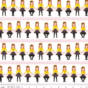 Fabric with a print of Emma Watkins from The Wiggles in a ballet outfit at a barre, with a ruler at the bottom showing the fabric's width.
