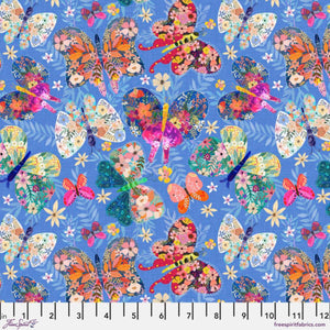 A blue fabric featuring a vibrant pattern of colorful butterflies and floral designs.