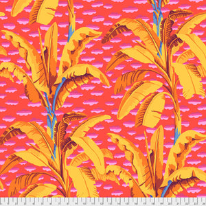A piece of fabric featuring a vibrant print with banana trees in yellow and orange on a red background.