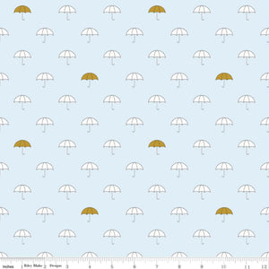 A fabric featuring a pattern of white umbrellas with gold accents on a blue background.