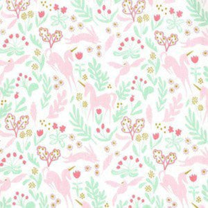 A fabric featuring a white, pink, and gold unicorn pattern with floral designs on a cotton material.